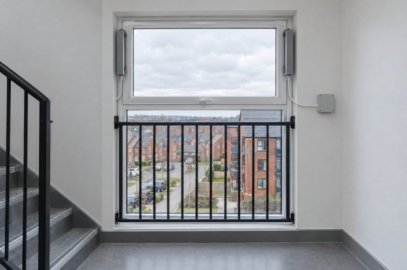 A new AOV window vent fitted in a stairwell