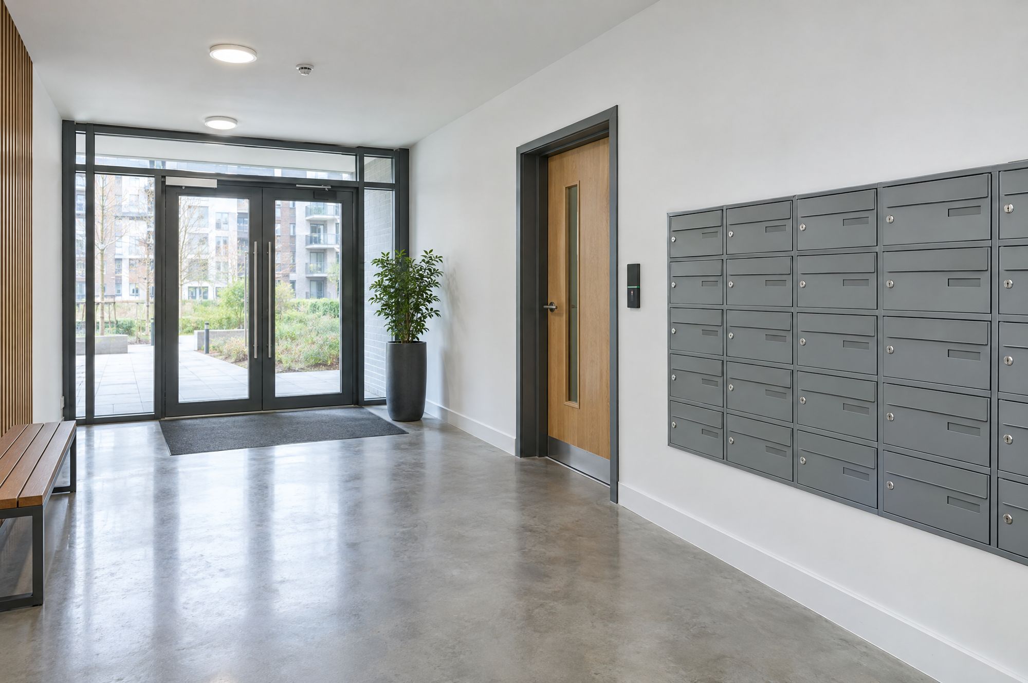 Communal entrance lobby with post boxes